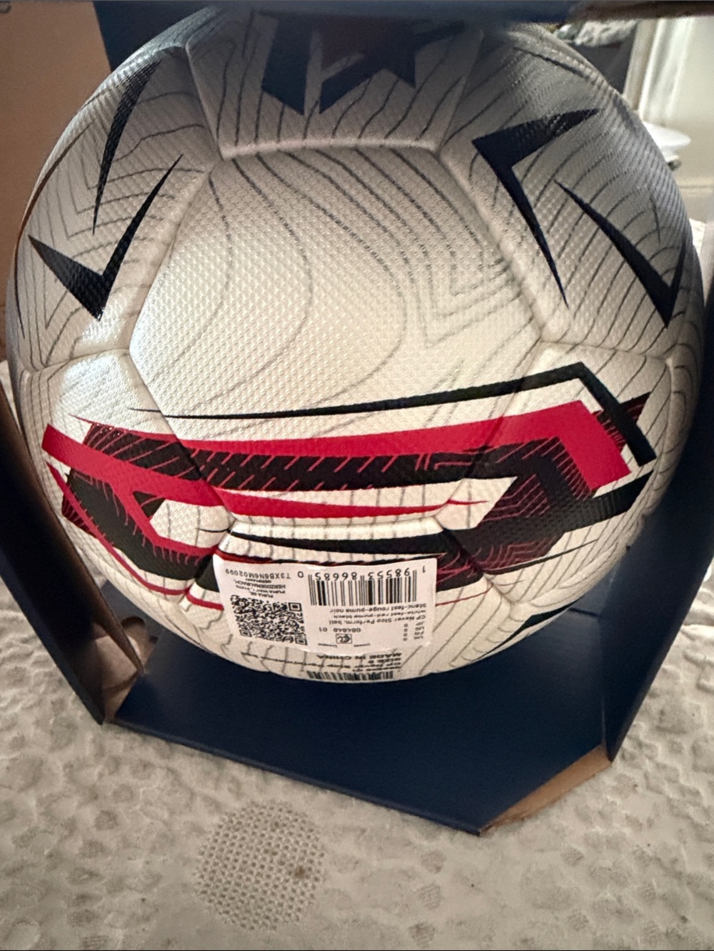 Puma White Soccer Ball with Black and Red Graphics